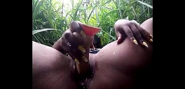  Village girl putting dildo in her vagina in the wild